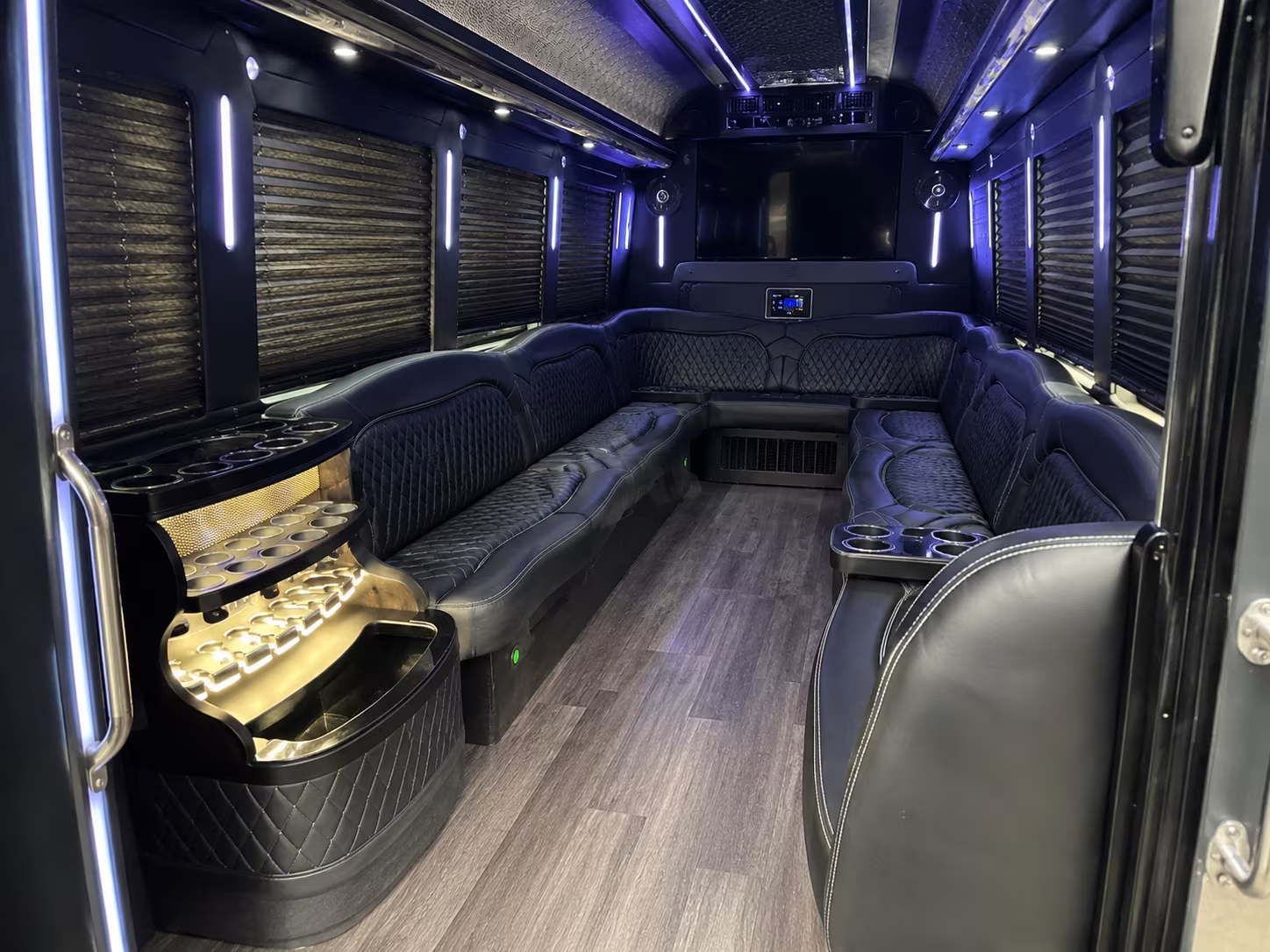 Wedding guests seated inside a party bus serving Atlantic City